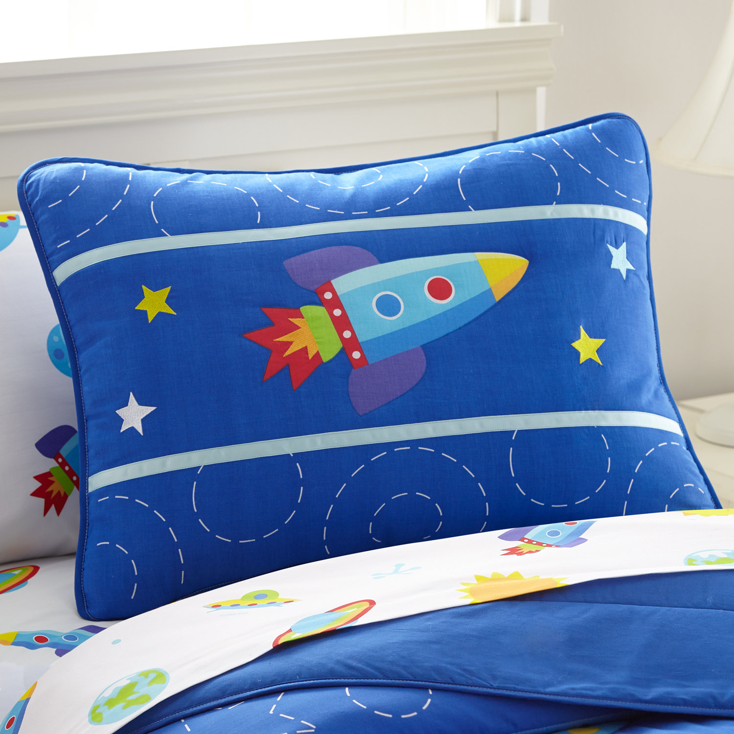 Olive kids out of this world bedding Our NEW Out of This World upgraded children's planets bedding is % cotton percale. Our kids comforter has a galaxy of planets, rocketships and comets against a swirly space background. The reverse is a starfield on blue.
